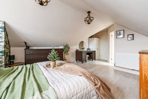 Bedroom One- click for photo gallery